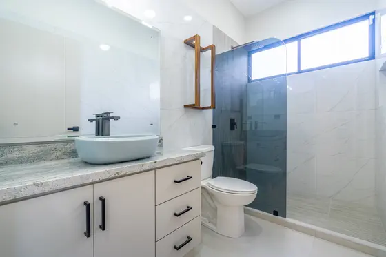 Reference image of the previous home, not the updated design · Riverbend Design 1 — bathroom