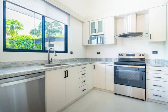 Reference image of the previous home, not the updated design · Riverbend Design 1 — kitchen