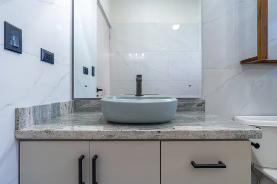 Reference image of the previous home, not the updated design · Riverbend Design 1 — bathroom